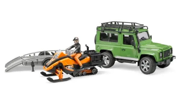 Auto Land Rover Defender - z lawetą, skuterem śnieżnym i figurką - ZESTAW - 02594 - BRUDER