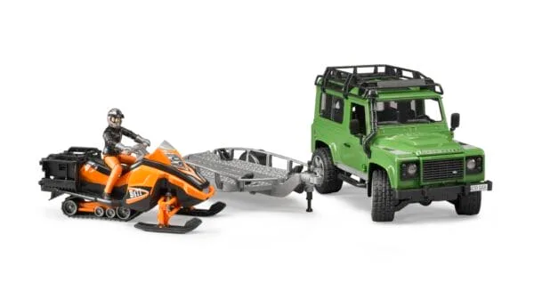 Auto Land Rover Defender - z lawetą, skuterem śnieżnym i figurką - ZESTAW - 02594 - BRUDER