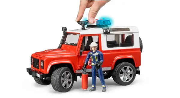 Auto Land Rover Defender - Straż pożarna z figurką strażaka i modułem - 02596 - BRUDER