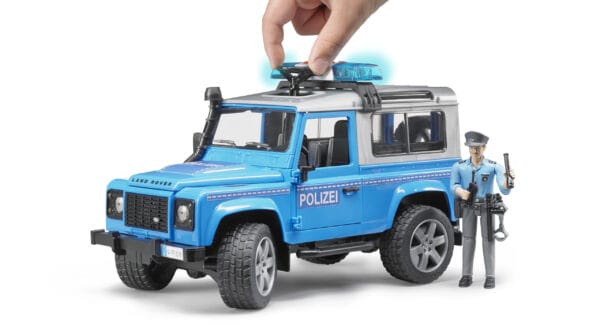 Auto Land Rover Defender - policyjny niebiesko srebrny z figurką policjanta i modułem - 02597 - BRUDER 8